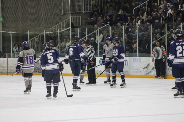 Weber State Wildcats facing off against Utah State Aggies at an away game.