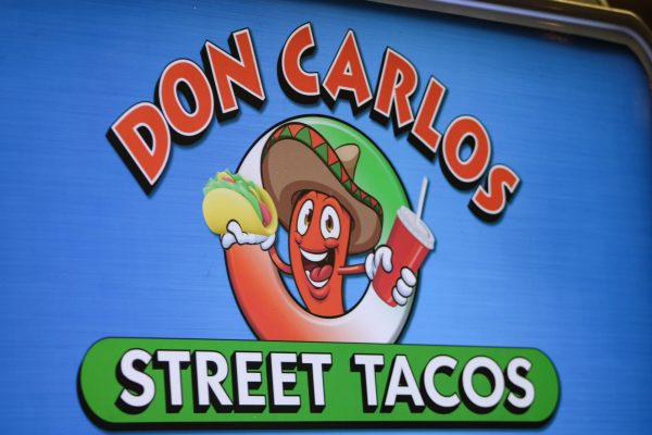 The logo of Don Carlos Street Tacos on Harrison Blvd.