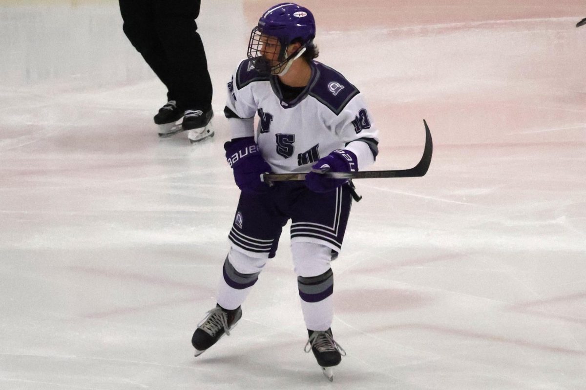 Weber State University Forward, Cory Mater (#10), watching out for the puck.