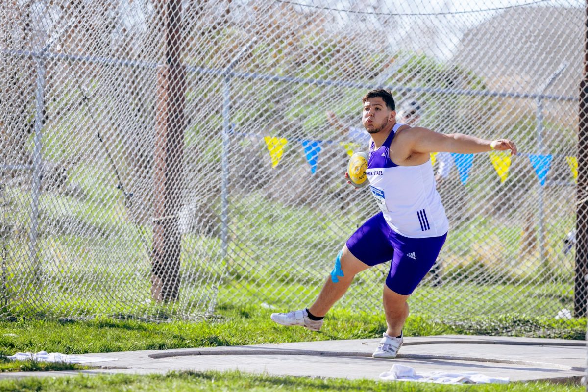 Jeims Molina, a thrower for Weber State competing in the 2024 Big Sky championship as he's throwing discus.// Jeims Molina, un tirador de disco de Weber State compitiendo en el campeonato de Big Sky en el 2024 mientras tire el disco.