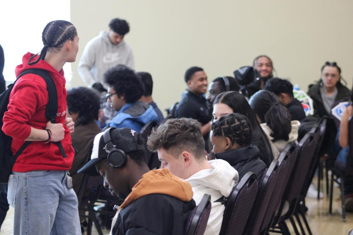 Weber State students wait at the Strands of Strength event to have their hair done.