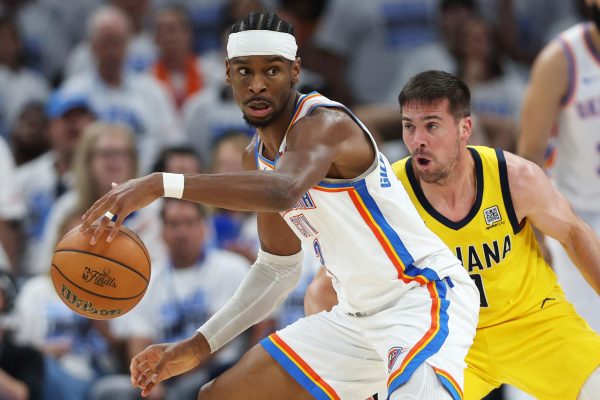 Shai Gilgeous-Alexander (#2) of the Oklahoma City Thunder is defended by T.J. McConnell (#9) of the Indiana Pacers during the third quarter in Game Five of the 2025 NBA Finals at Paycom Center on June 16, 2025 in Oklahoma City, Oklahoma.