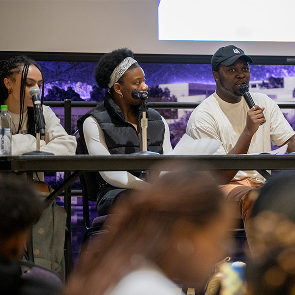 Speakers during a panel discussion at Weber State University during Black History Month. // Oradores durante una mesa redonda en la Universidad Weber State durante el Mes de la Historia Negra.