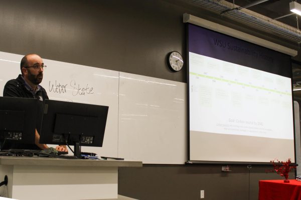 Justin Owens presents information on his financial findings, in the Noorda Buildiing for the Energy Conference on April 6, 2026.