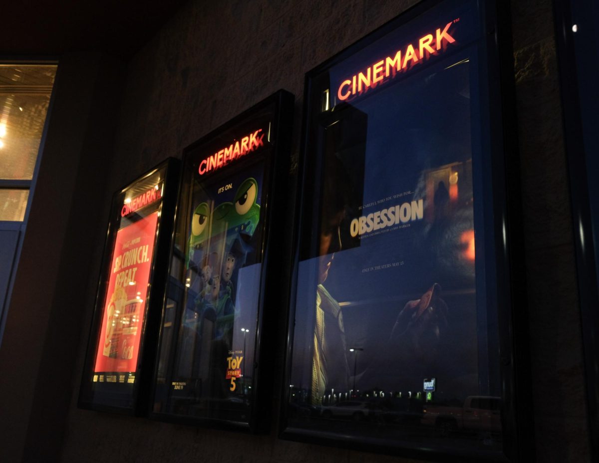Movie advertisements line the exterior of the Layton Cinemark, including a display for "Obsession," on June 22, 2026.