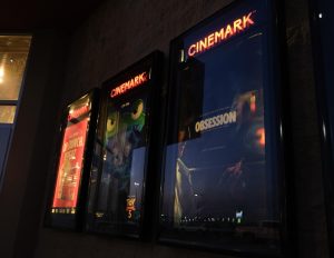 Movie advertisements line the exterior of the Layton Cinemark, including a display for "Obsession," on June 22, 2026.