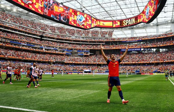 Spain's Mikel Merino celebrates scoring their second goal against Belgium on July 10, 2026.
