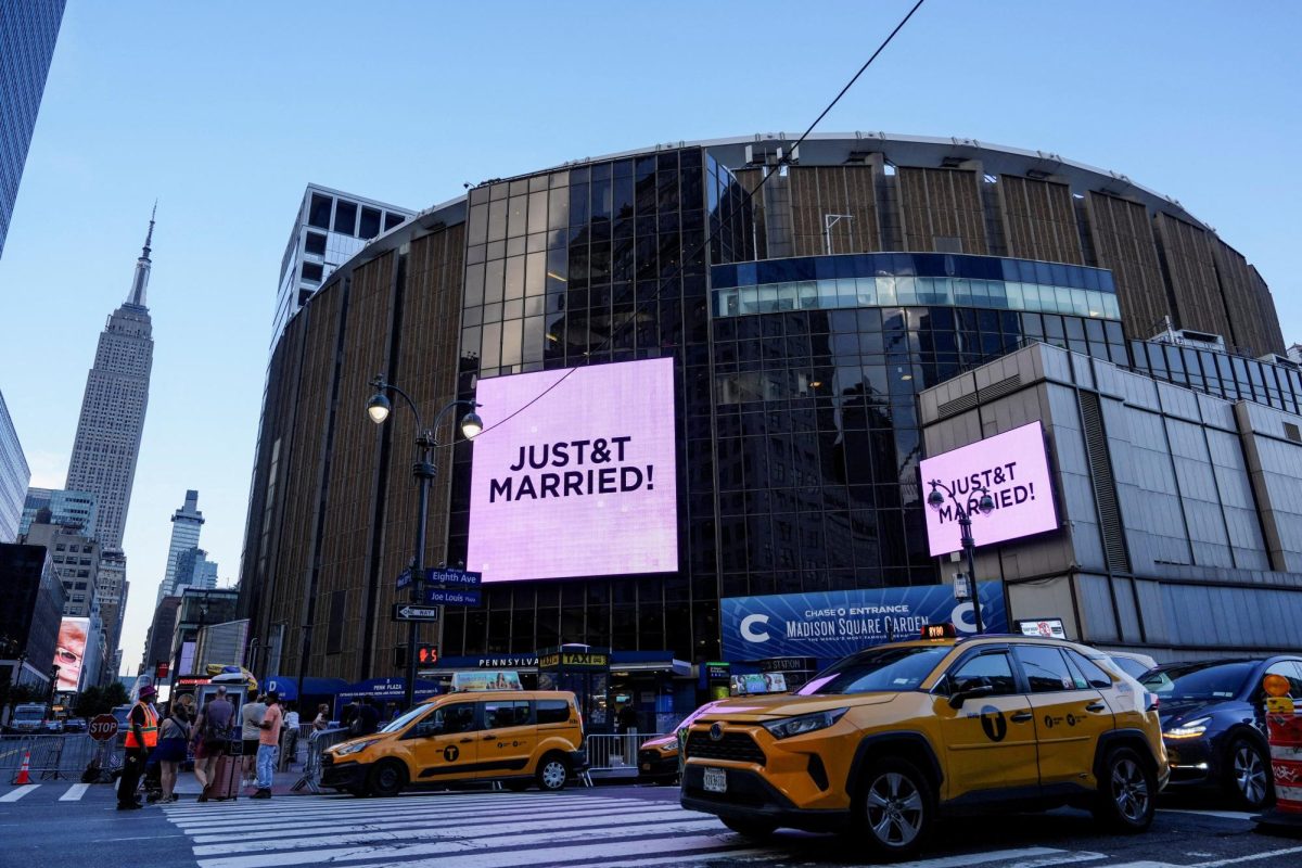 Screens display a message referencing singer Taylor Swift and National Football League (NFL) player Travis Kelce outside Madison Square Garden, the venue for their reported wedding celebrations, in New York, U.S., July 3, 2026.